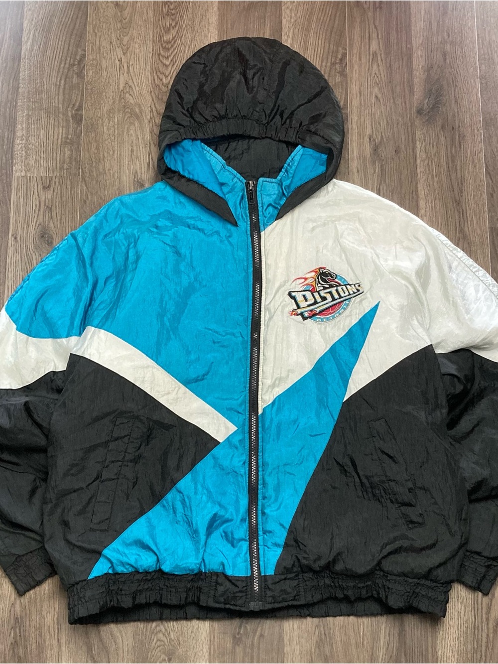 Vintage 1990s Detroit Pistons Teal Puffer Jacket